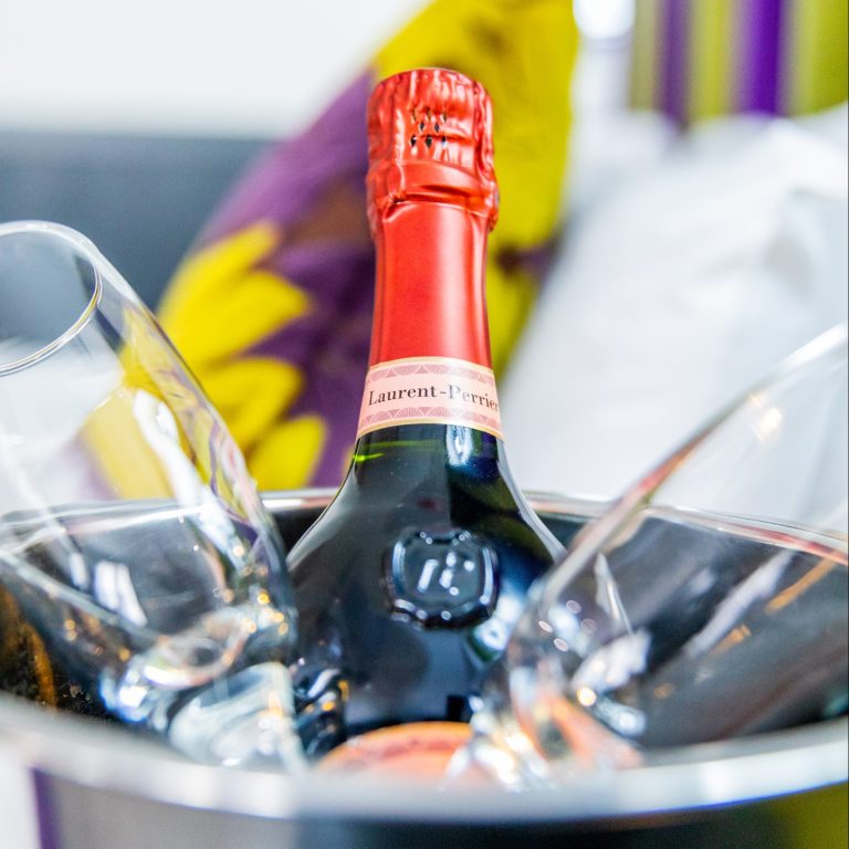 image of a bottle of champagne in an ice bucket